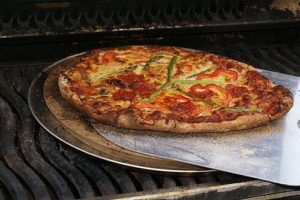 Grilling on a pizza stone = perfect pizza every time.