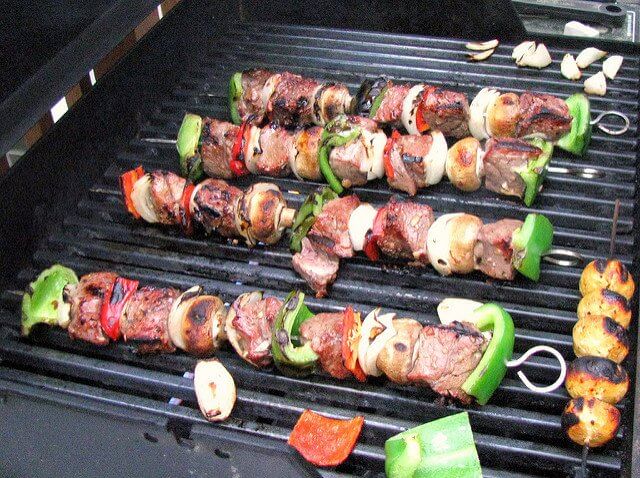 Offering meat and vegetable kabobs will impress your carnivore and vegetarian friends alike.
