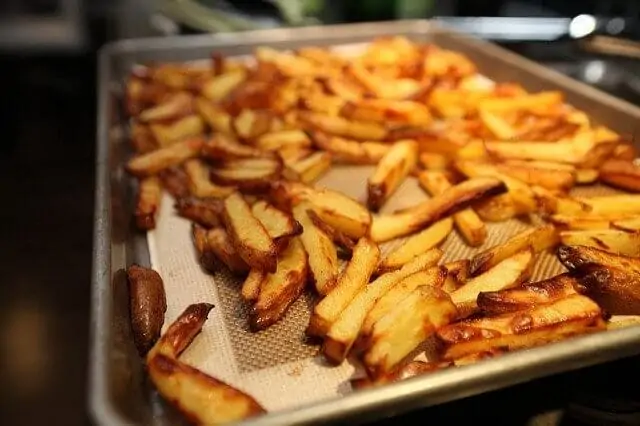 Bake fries and veggies in the oven instead of deep-frying them for healthier snacks.