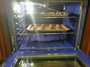 In conventional ovens, cookies cook differently on each rack.
