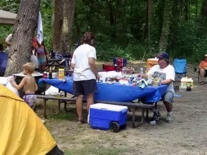 Taking a cooler along on your camping trip can save time and money.
