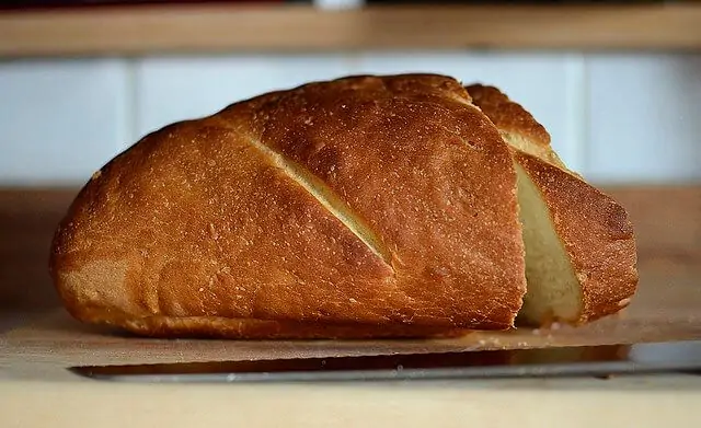 Freshly Baked and Sliced Loaf of Bread