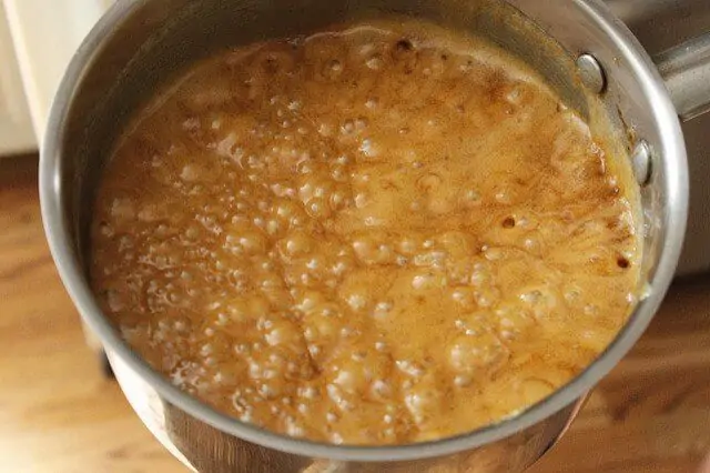 caramel bubbling in a sauce pan