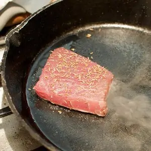 Cast iron cookware is a great material to look for when pan searing fish.