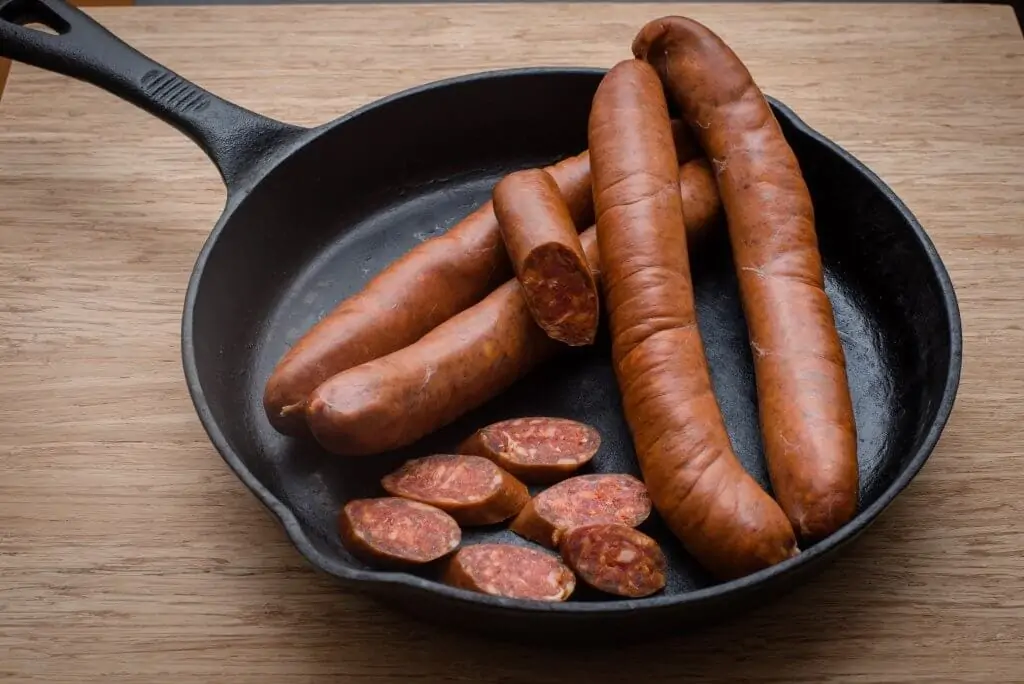sausages in cast iron sk