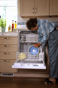 Open dishwasher with dishes