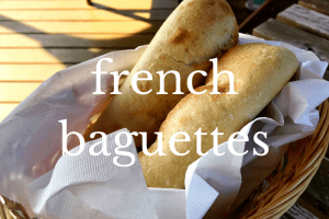 two baguettes in a lined basket