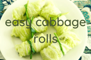 cabbage rolls on white plate