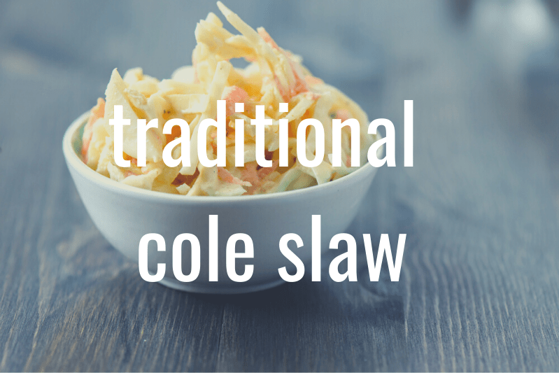 small white bowl of coleslaw on wooden table