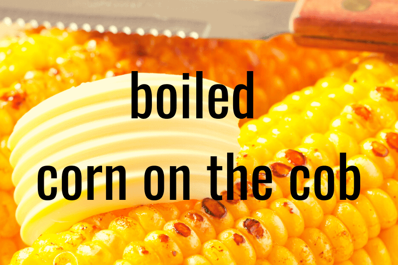 close up of corn on the cob with pat of butter