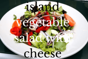 green salad in white bowl