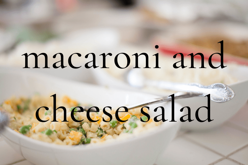 macaroni salad in white dish on table