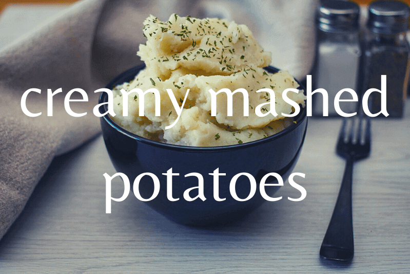 black bowl of mashed potatoes