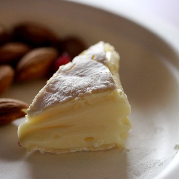 a small Pont-l’Eveque slice with almonds