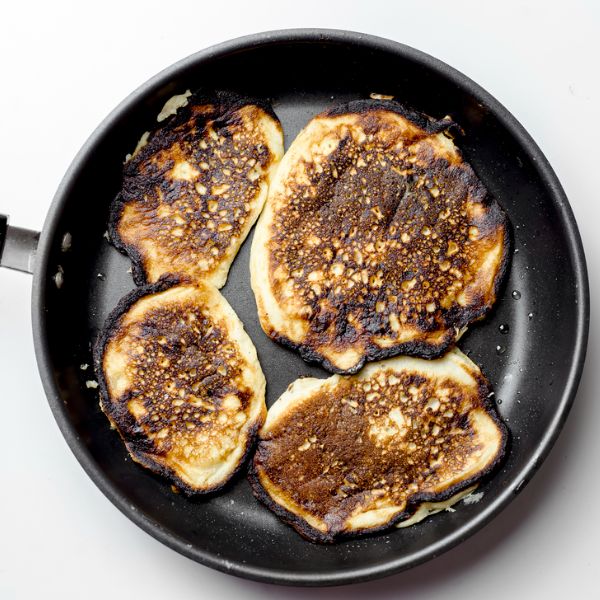 burnt pancakes on a non-stick pan