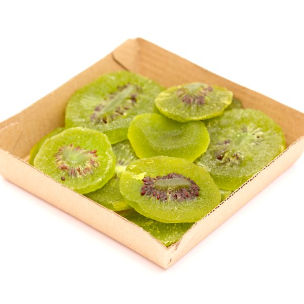 dried kiwi slices on a paper plate