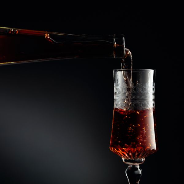 Fortified wine being poured into a glass