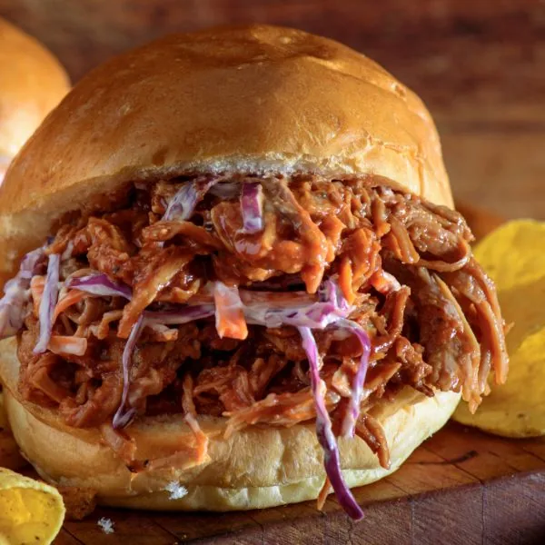 Close up of a Coca Cola Pulled Pork sandwich
