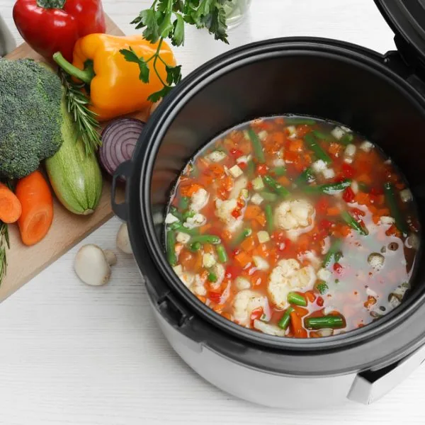 Prepped vegetable soup in a slow cooker