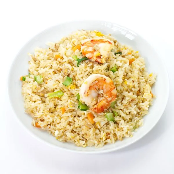 Fried rice on a white plate on top of a white background