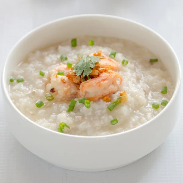 Rice porridge with shrimp on top