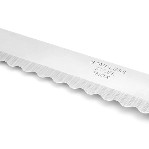 Serrated knife close-up on a white background
