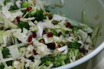 Broccoli cranberry salad in a green bowl