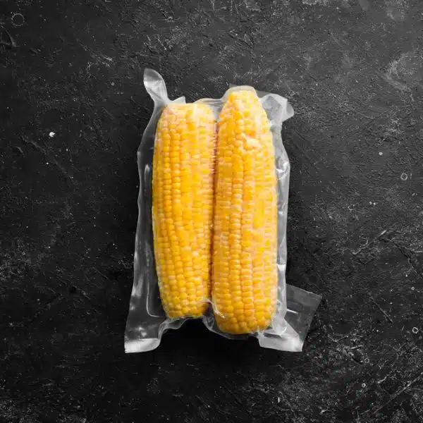 Fresh corn vacuum-sealed in plastic