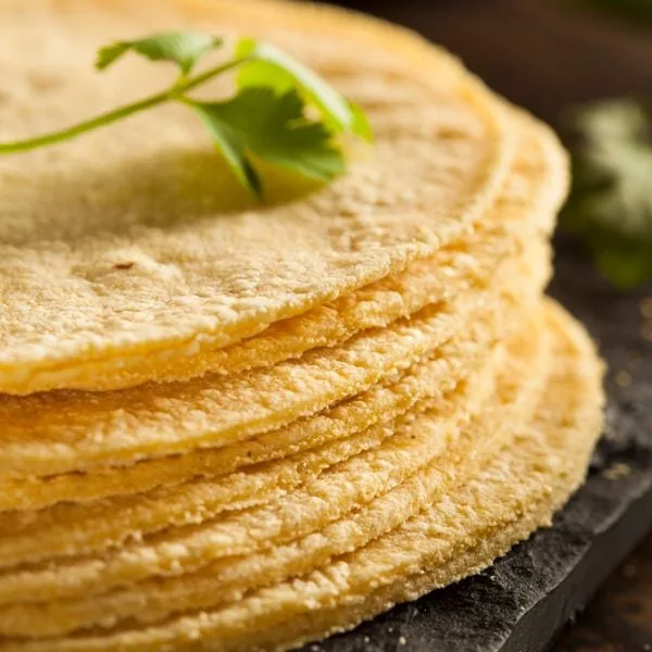 Homemade corn tortillas stacked together