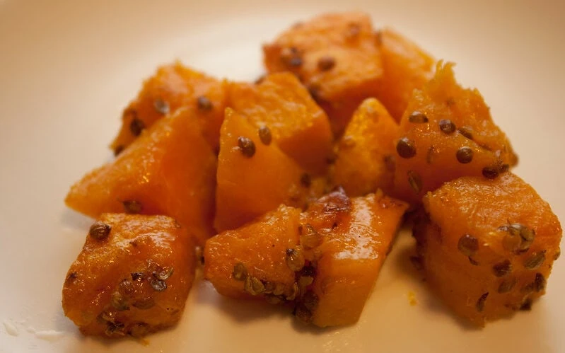 Roasted butternut squash on a white plate